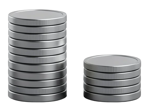 Two stacks of plain blank coins side by side, the right stack clearly shorter; one loose coin resting in front.