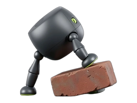 A small four-legged robot lifts one leg over a tilted brick lying in its path, its body leaning to keep balance.